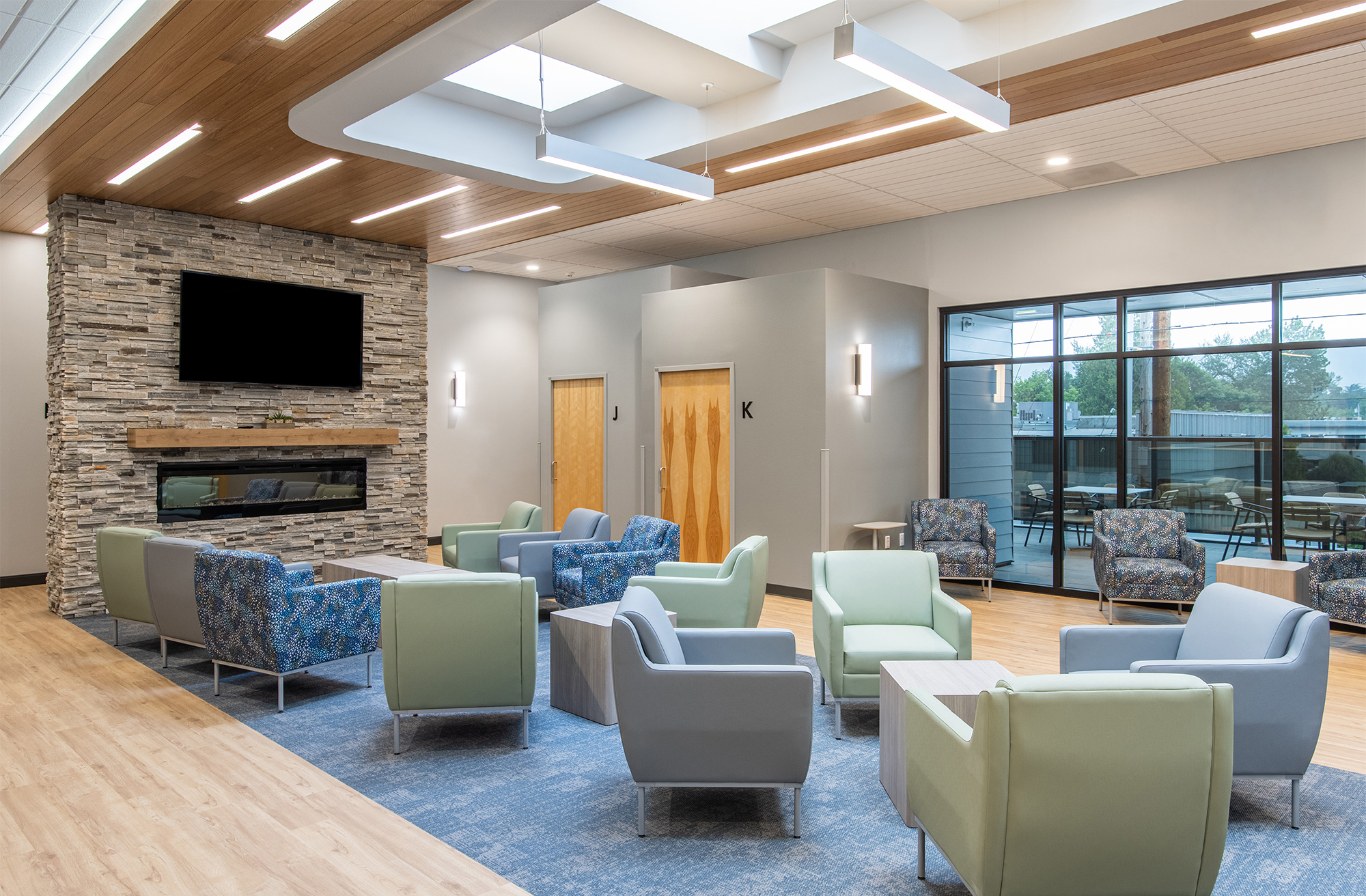 Bridgeway Recovery medical center waiting room stone fireplace armchairs